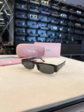 Miu Miu Rectangular Sunglasses Black Frame Grey Lenses