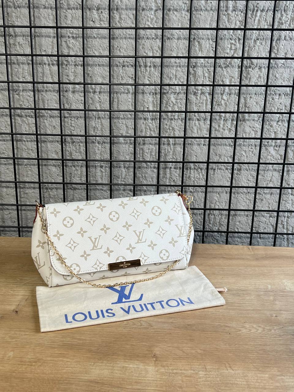Louis Vuitton Monogram Empreinte Clutch White