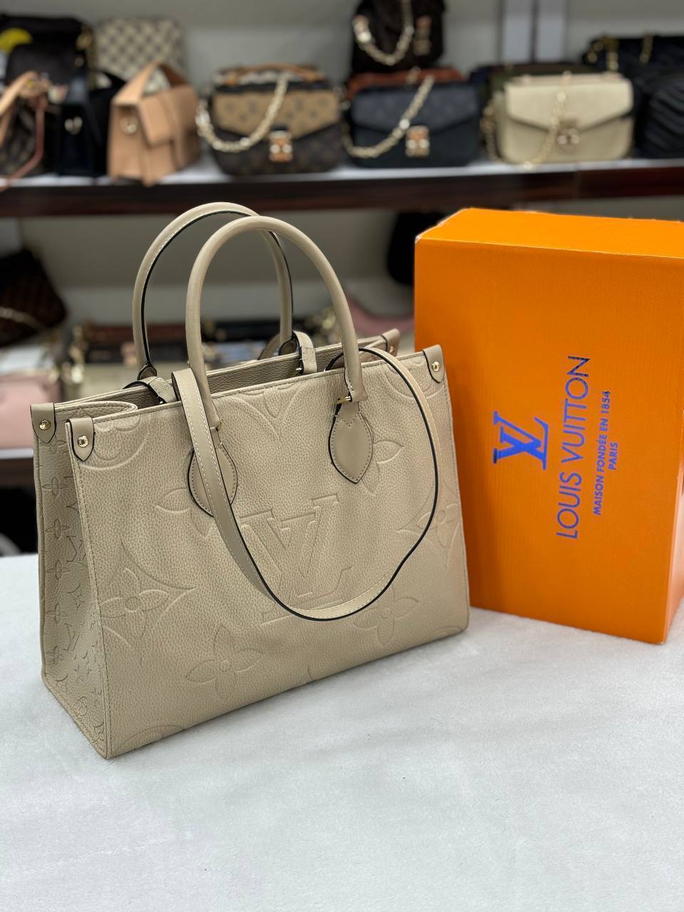 Louis Vuitton Onthego MM Monogram Empreinte Beige