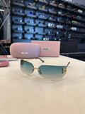 Miu Miu Rimless Sunglasses