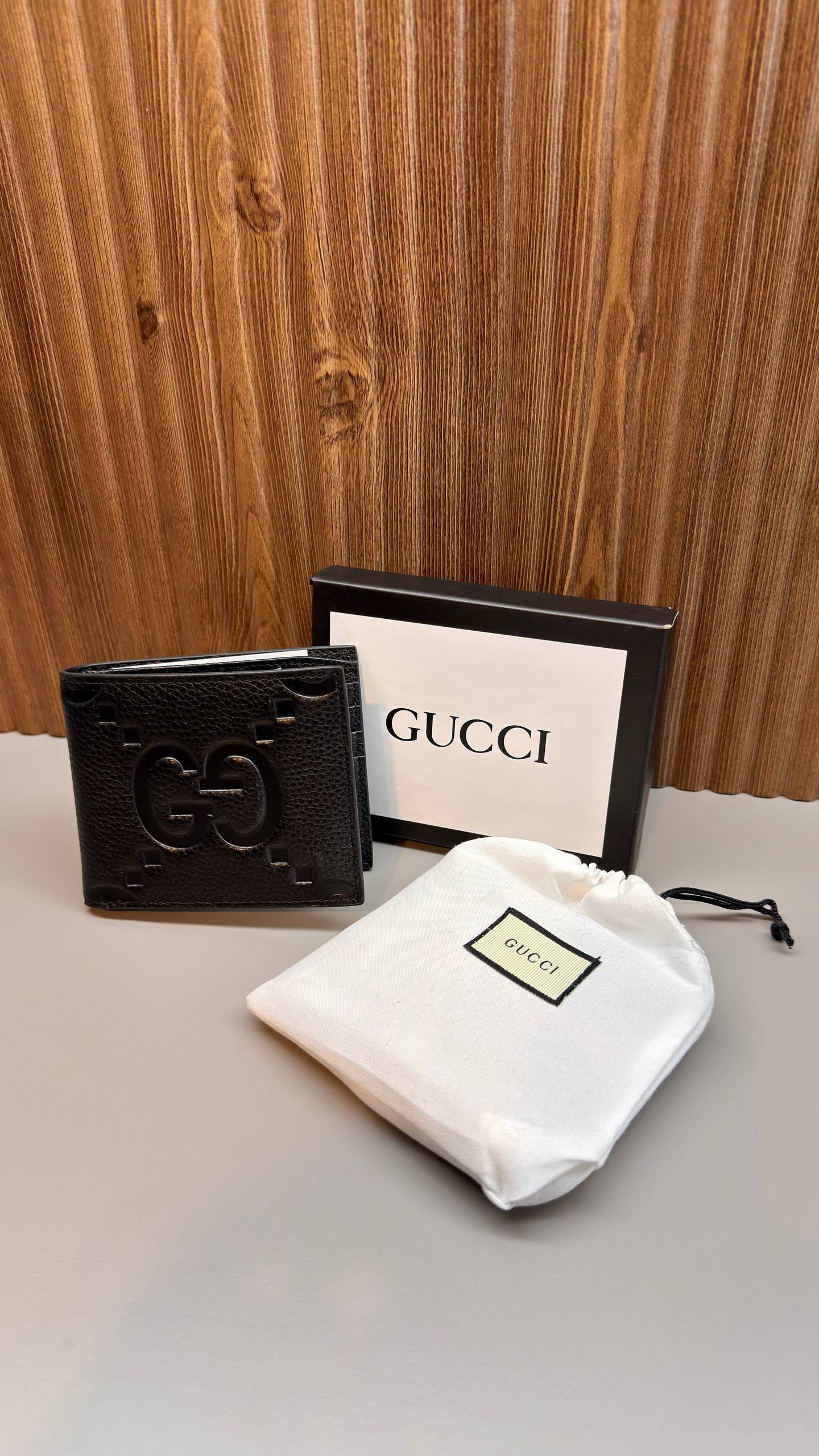 Gucci GG Embossed Leather Wallet