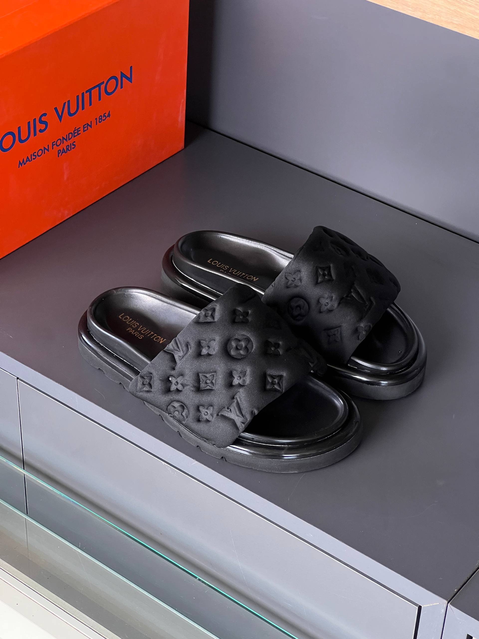 Louis Vuitton Monogram Embossed Slides Black