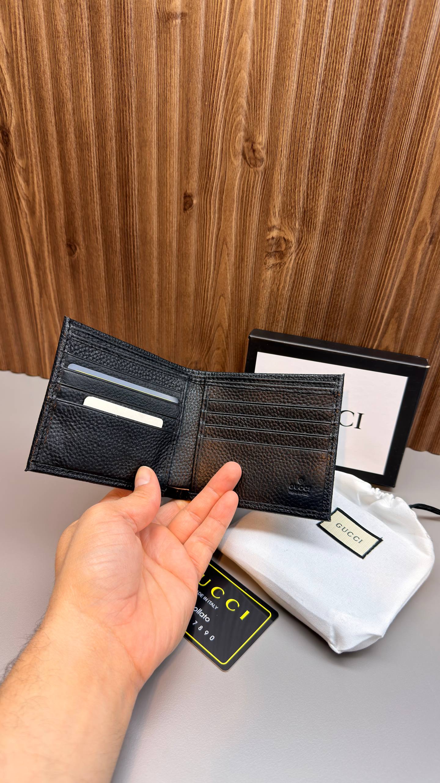 Gucci GG Embossed Leather Wallet