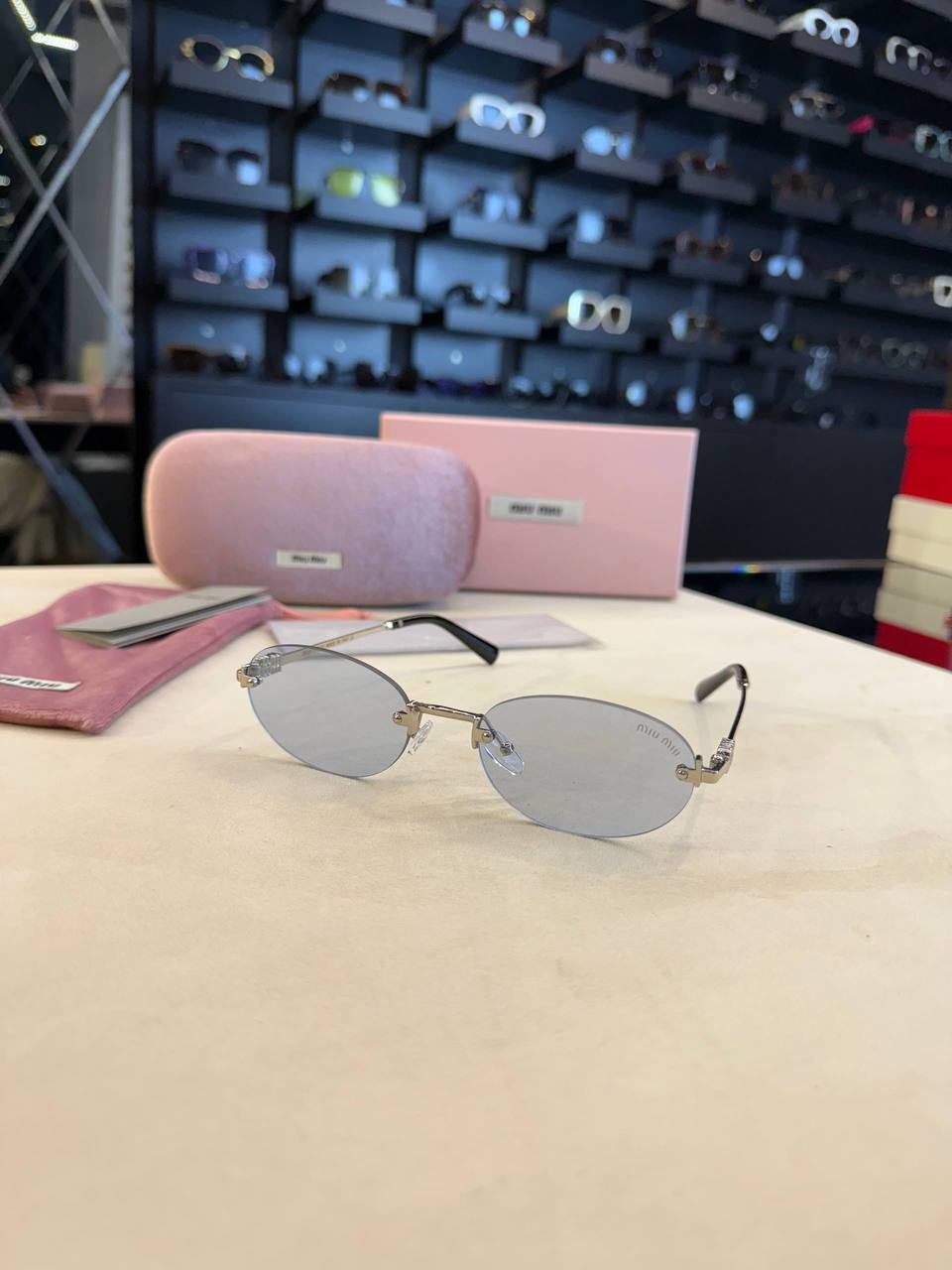 Miu Miu Rimless Oval Sunglasses Silver Frame
