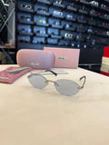 Miu Miu Rimless Oval Sunglasses Silver Frame