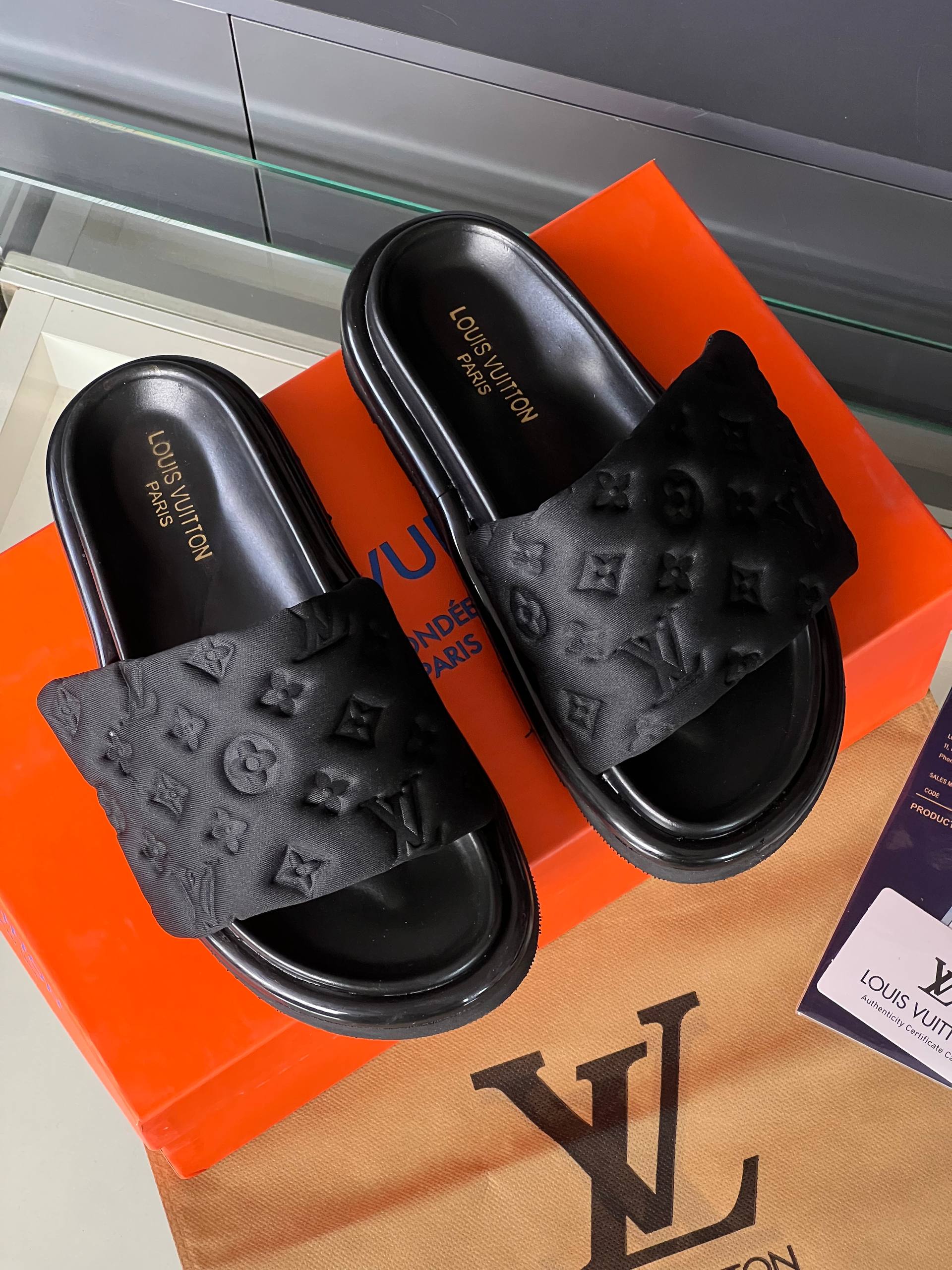 Louis Vuitton Monogram Embossed Slides Black